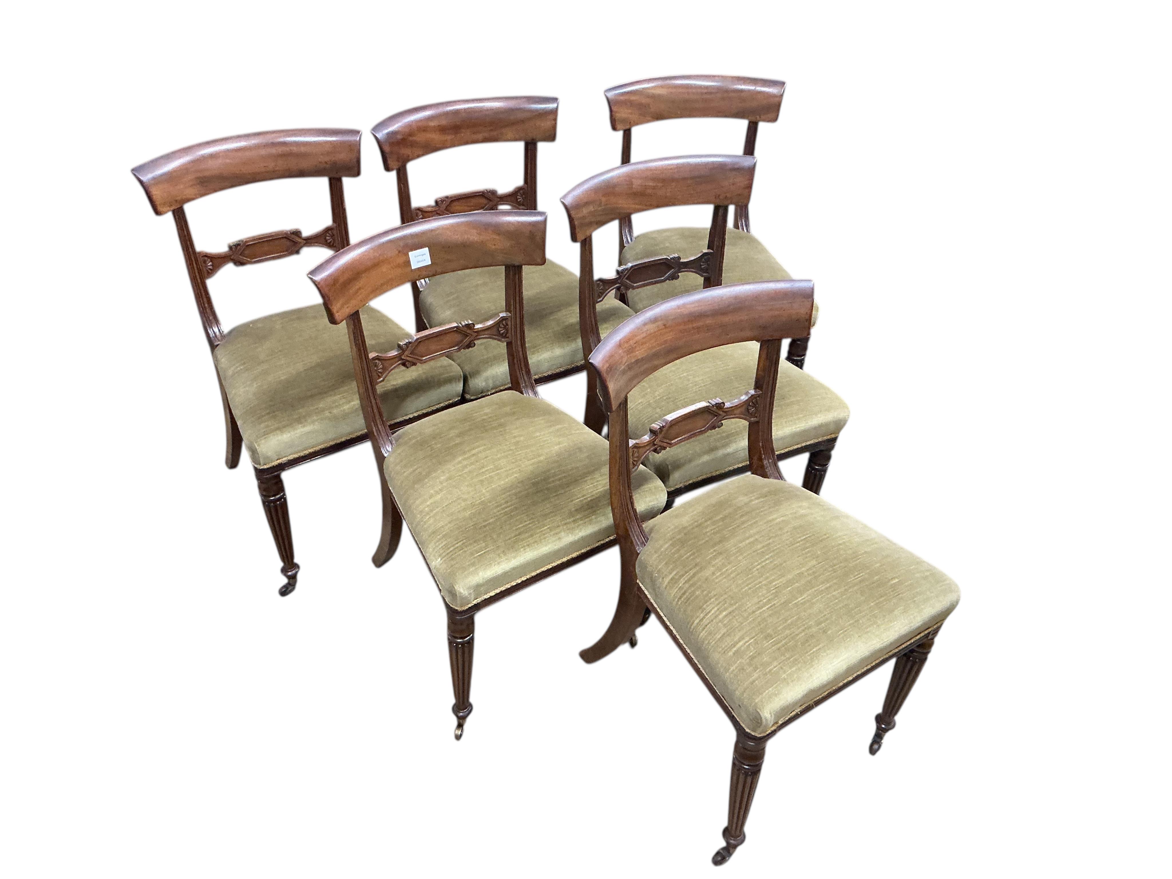 A set of six Regency mahogany bar back dining chairs on fluted legs
